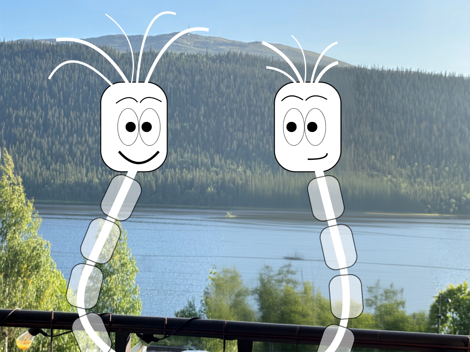 Two Noa figures in front of the mountain and the lake